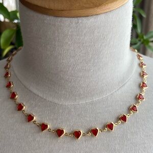 Charming Gold Necklace with Red Heart Accents